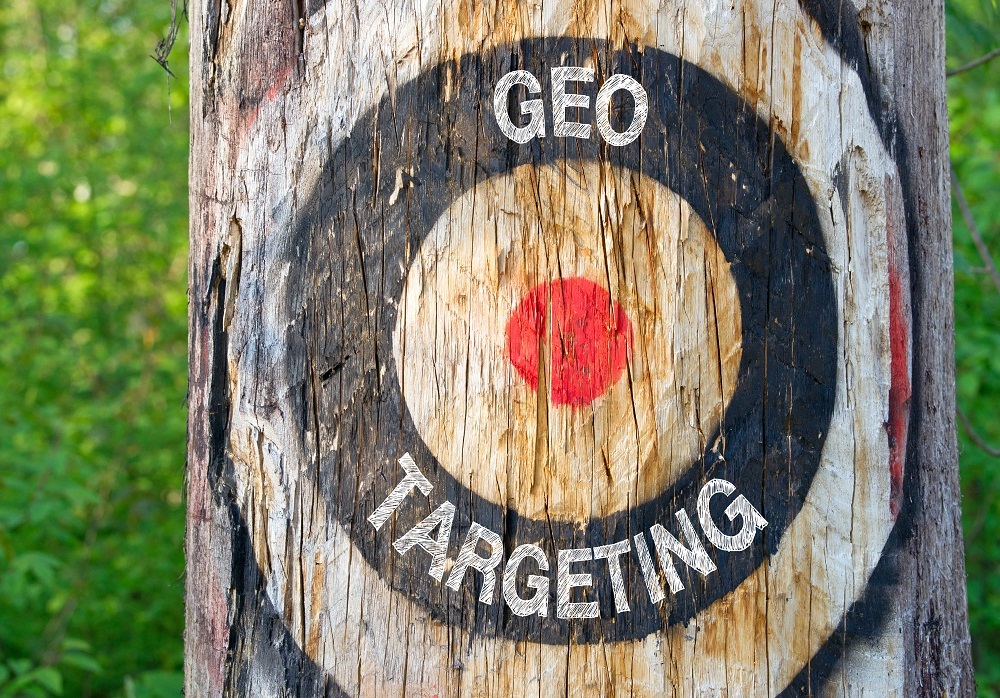 Geo Targeting - tree with target and text in the forest - Geotargeting, Geomarketing, Geolocation